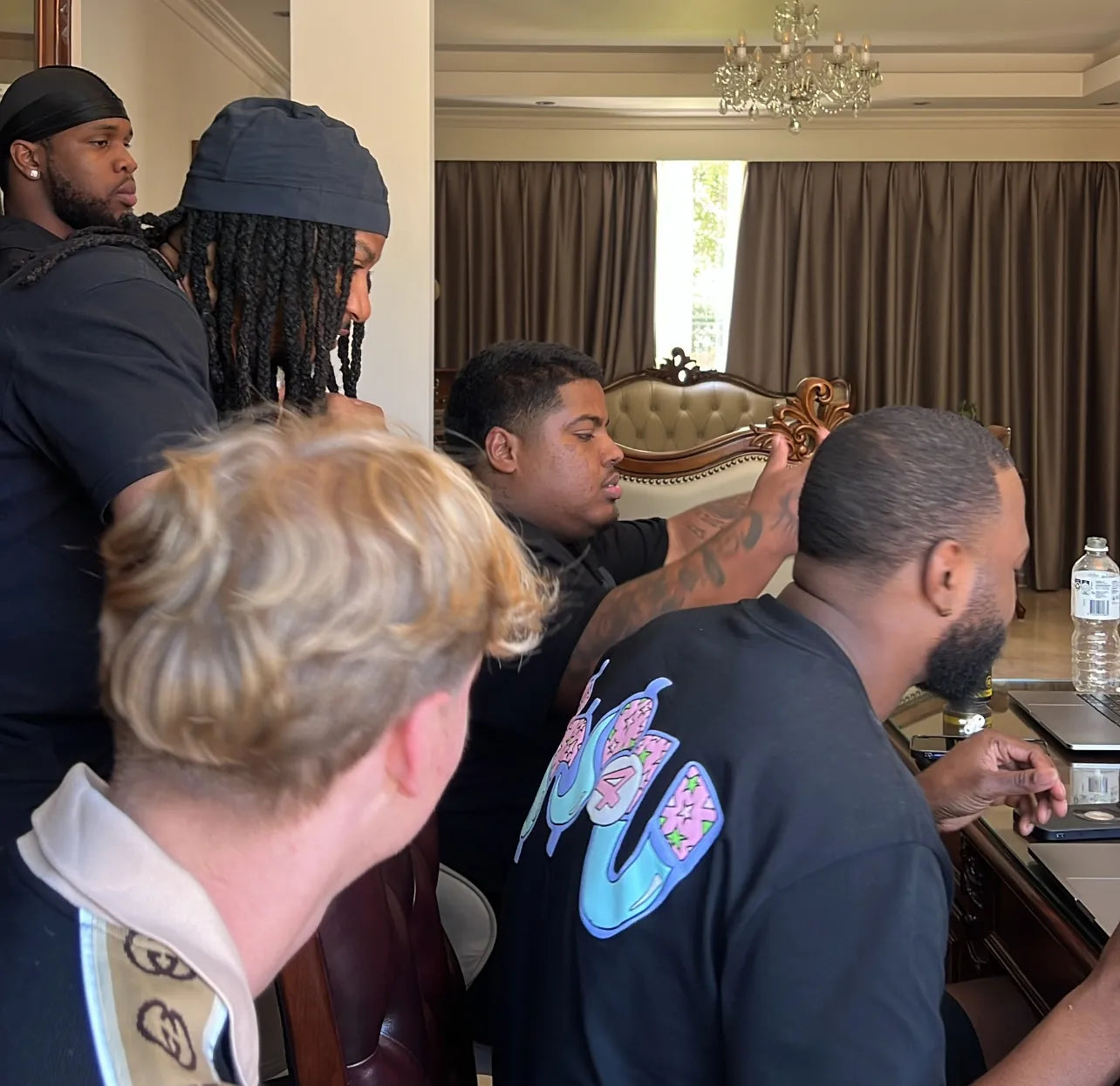 Artists huddled around the session